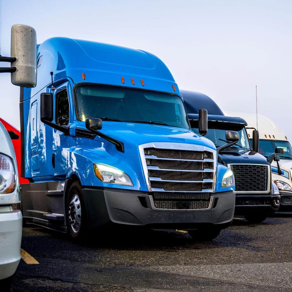 A fleet of diesel trucks.